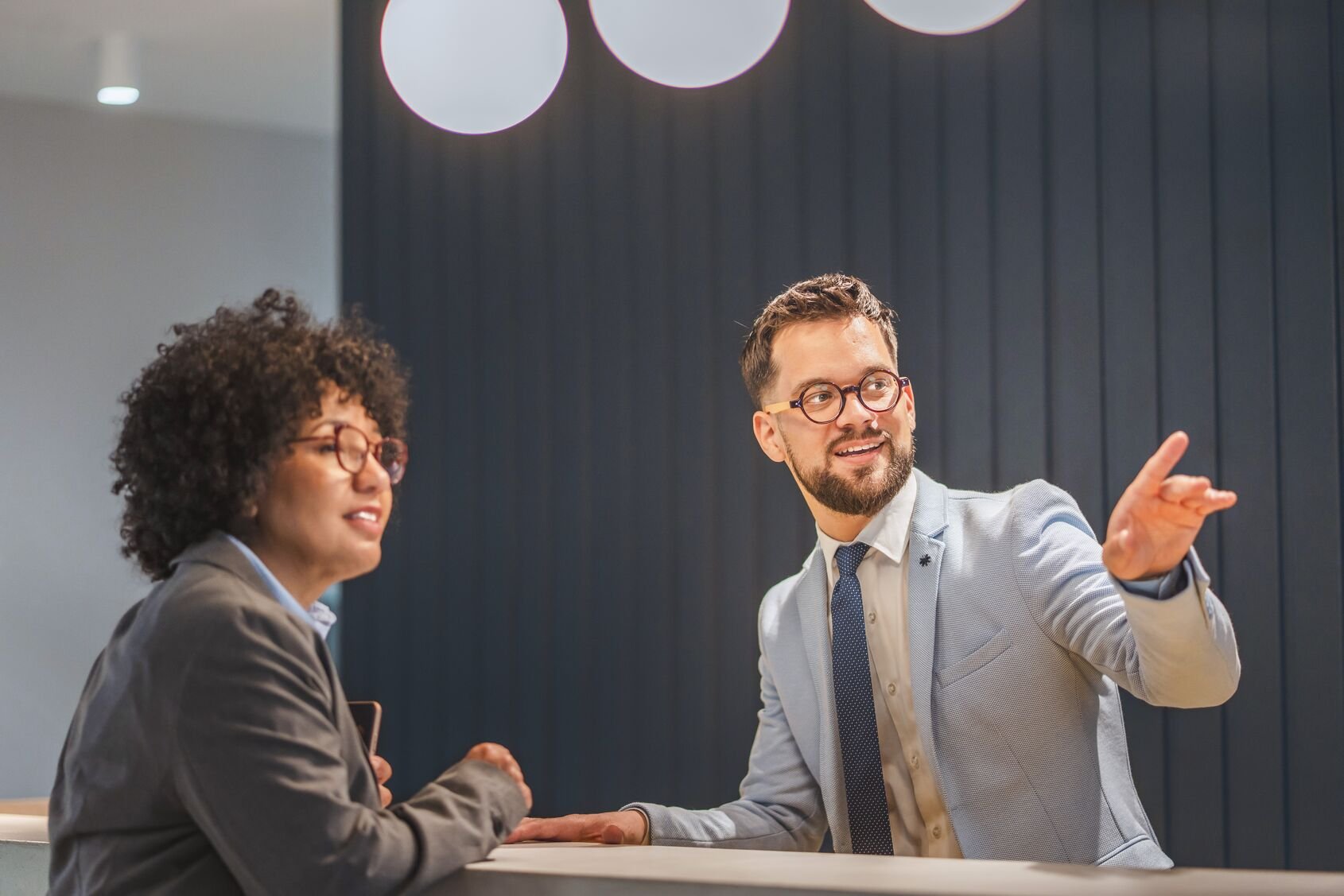 Web_Wide-Multicultural businesspeople meeting at the reception in the company